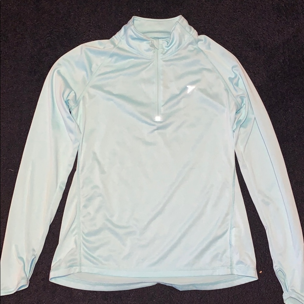 Light blue running top